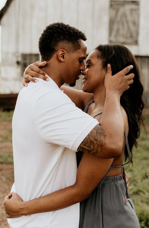 A couple holding each other close